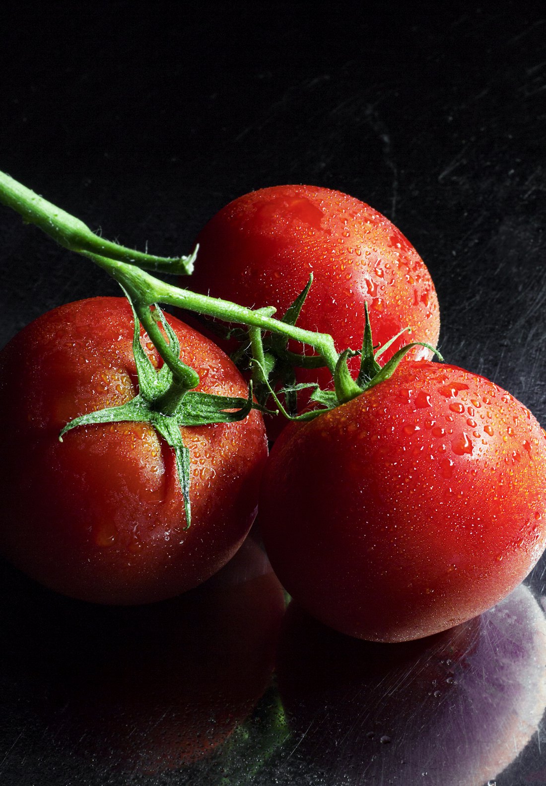 Ripe tomatoes on the vine